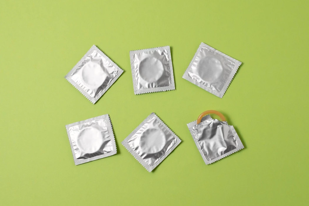 Abstract sexual health assortment with condom